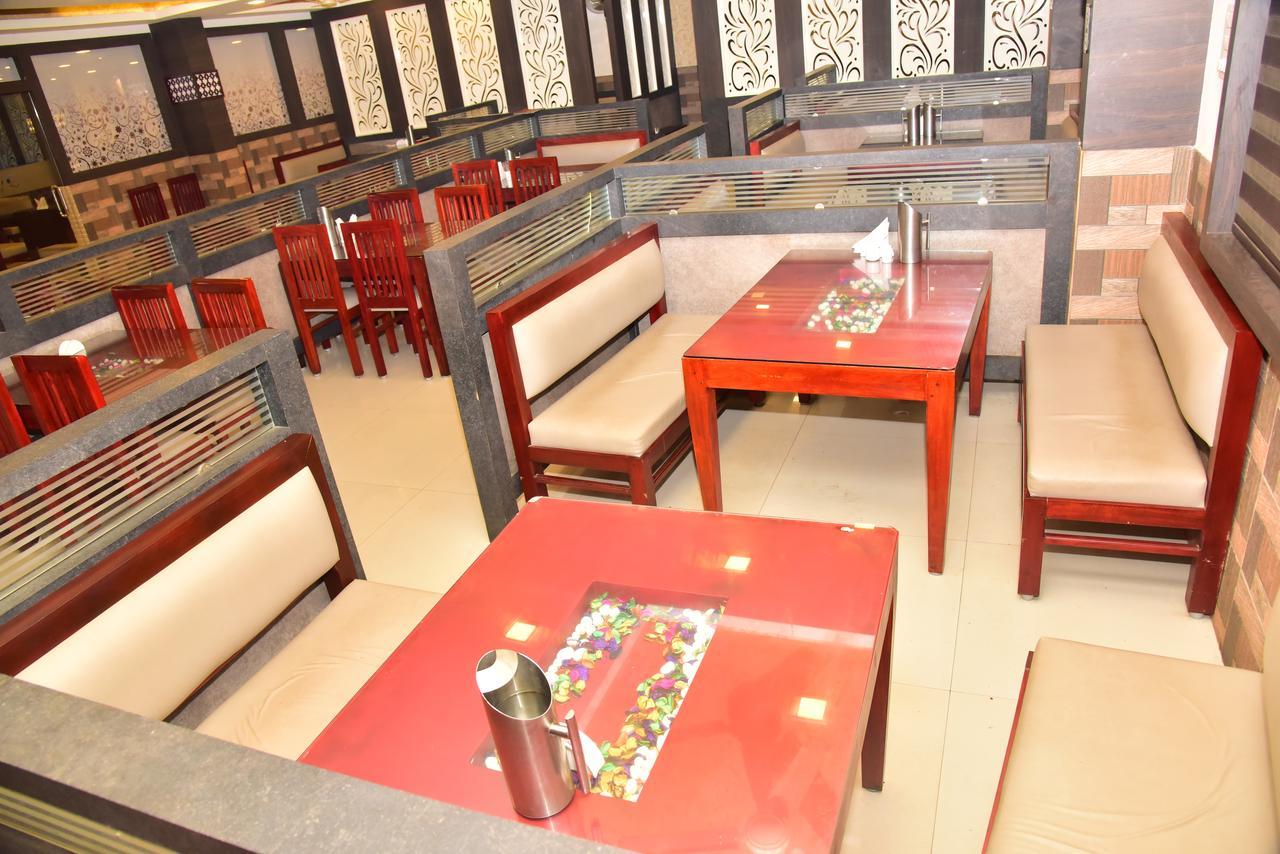 Bright Palace Restaurant And Residency Hotell Shimoga Eksteriør bilde
